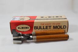 One Lee wood handle single cavity bullet mold for 214 gr SWC 44 cal. Used in box.