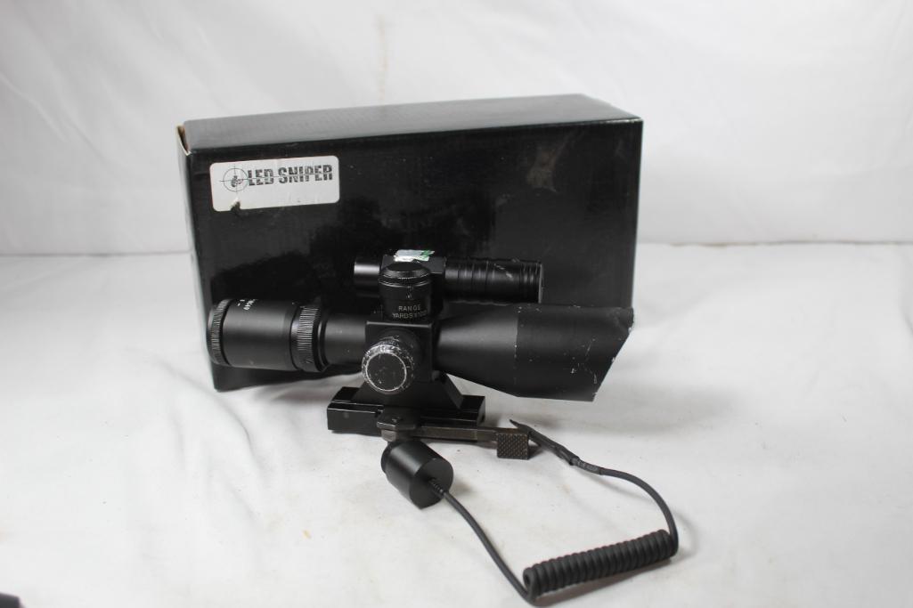 LED Sniper 2.5-10x40 with laser rangefinder post and crosshair rifle scope. Used in box.