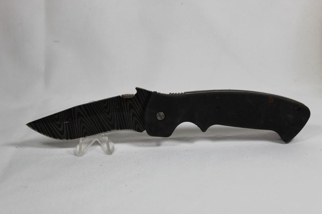 Large single blade liner lock with 3.75 inch blade. Pocket clip. Good condition. China.