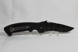 Large single blade liner lock with 3.75 inch blade. Pocket clip. Good condition. China.