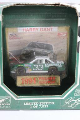 One limited 1994 Limited edition #33 race car in package, one snakeskin belt buckle and on Street