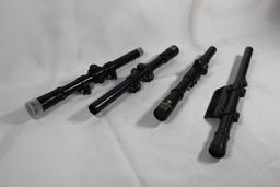 Four 22 cal rifle scopes. One Revelation, one unknown and two Tasco. Used.
