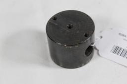 One Metal roll cylinder for unknown reloading powder dump. Used.
