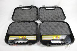 Two Glock pistol cases. Used, both are foam lined.