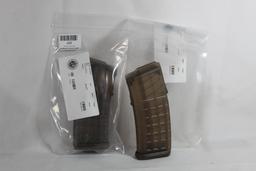 Two Steyr AR plastic magazines. New, in packages.