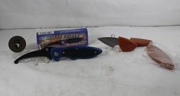 One folding knife, one 101st Airborne metal and to fishing lure knives.