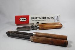 One Lee bullet mold handle in box and one old style bullet mold handle. Used.