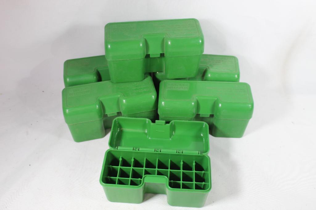 Six green small magnum rifle cartridge MTM 22 round ammo boxes.