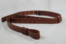 One military style rifle sling.