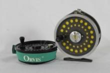 One Orvis Magnalite fly reel in bag and one Orvis extra fly spool for different fly reel. Both have