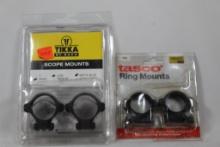 Two sets of scope rings, one Tikka 30 mm low matte blue and one Tasco both new in package
