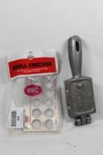 One aluminum 8 cavity 1/2 Oz slip egg sinker mold, and one MEC shotshell G0/No Go checker in