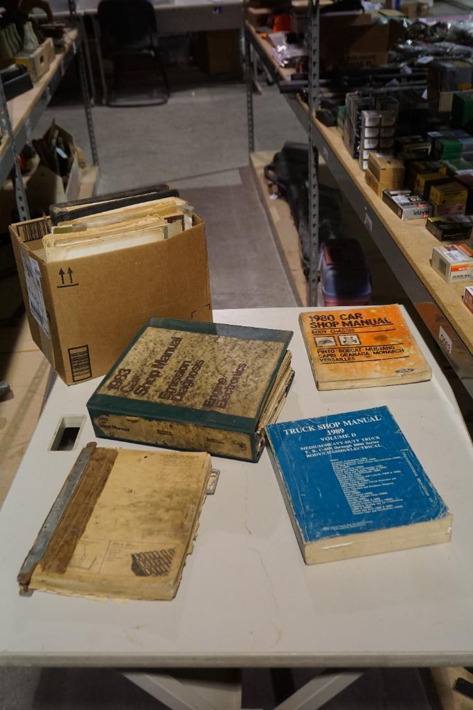 Two boxes of shop manuals. Used.