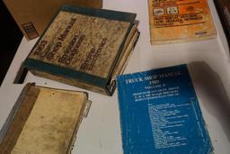 Two boxes of shop manuals. Used.