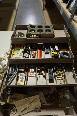 One Woodsman 3 tray tackle box with miscellaneous items, and one heavy nylon rope.