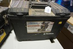 Two black plastic tool boxes. One 19" Stanley and one 17" Flambeau dry box.