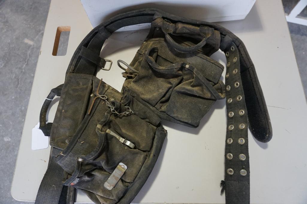 Black padded nylon tool belt with pouches. Used.