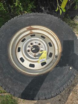 Set of (4 ) Jeep tires and rims.