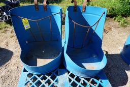 Two feeders made from plastic barrels