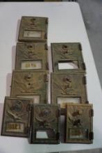 Twelve large and 4 small antique brass US post office box doors