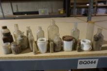 Miscellaneous small antique and small old bottles.