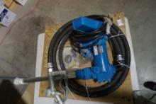 One 12 volt transfer pump with hose. New