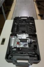 One Porter Cable small nail or brad air nailer. Looks new in plastic case.