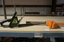 Two electric hedge trimmers, one Weed eater, and one Black & Decker. Used,