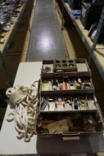 One Woodsman 3 tray tackle box with miscellaneous items, and one heavy nylon rope.