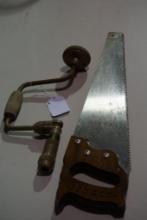 One Stanley 20" handsaw, and one hand drill. Used,