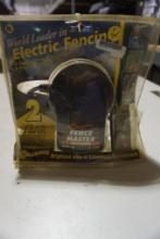One Gallagher electric fence charger. In package.