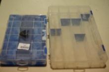 Two small compartment small item plastic boxes.