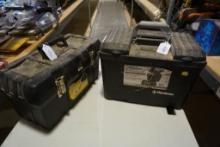 Two black plastic tool boxes. One 19" Stanley and one 17" Flambeau dry box.