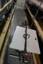 One gas Troy Bilt gas lawn trimmer. Used.