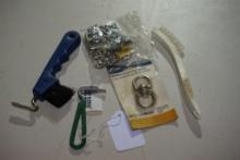 One nylon curb chain in package, two hoof picks, one hoof brush, and one double round eye swivel in