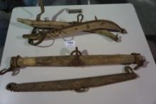 Antique wood horse collar, and two single hook yokes, one wood, and one metal.