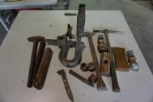 Old welding hammer, miners rock drilling punch, axe and sledge hammer heads, etc.