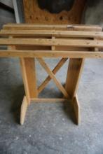 One wood saddle rack.