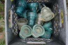 Basket of old glass insulators.