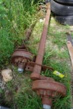 Pair of heavy duty trailer axles with the hubs.