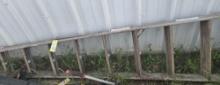 One ten foot wood step ladder, used.