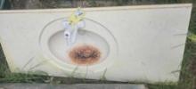One single porcelain bathroom sink. Used.