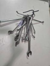 Twelve assorted Craftsman wrenches. Used.