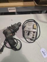 One M-Line electric soldering station, and one Black & Decker 3/8 drill. Used.