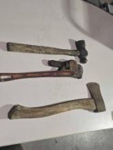 One hatchet, one ball peen hammer, and one 18" pipe wrench. Used.