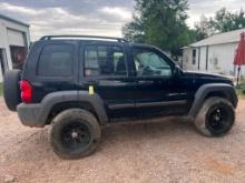 2003 Jeep Liberty 214,847 miles. Runs & Drives. Slow TITLE