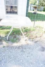 Square glass top patio table