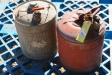Two 5 gal metal gas cans