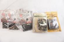Six Butt Stock long rifle nylon cartridge holders and two camo gun skins/socks, all new in pkg
