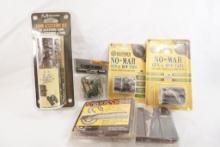Two NO-Mar gun & bow tape, two camp gun skins, one Realtree camo accessory kit and one roll of camo